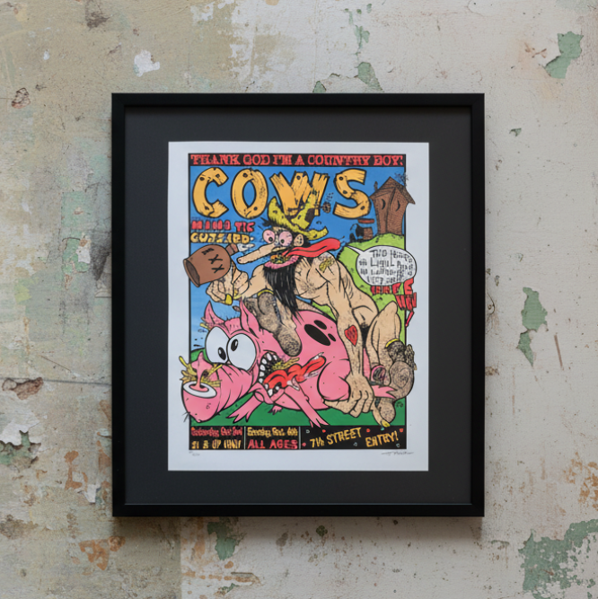 Cows poster on grungy garage wall